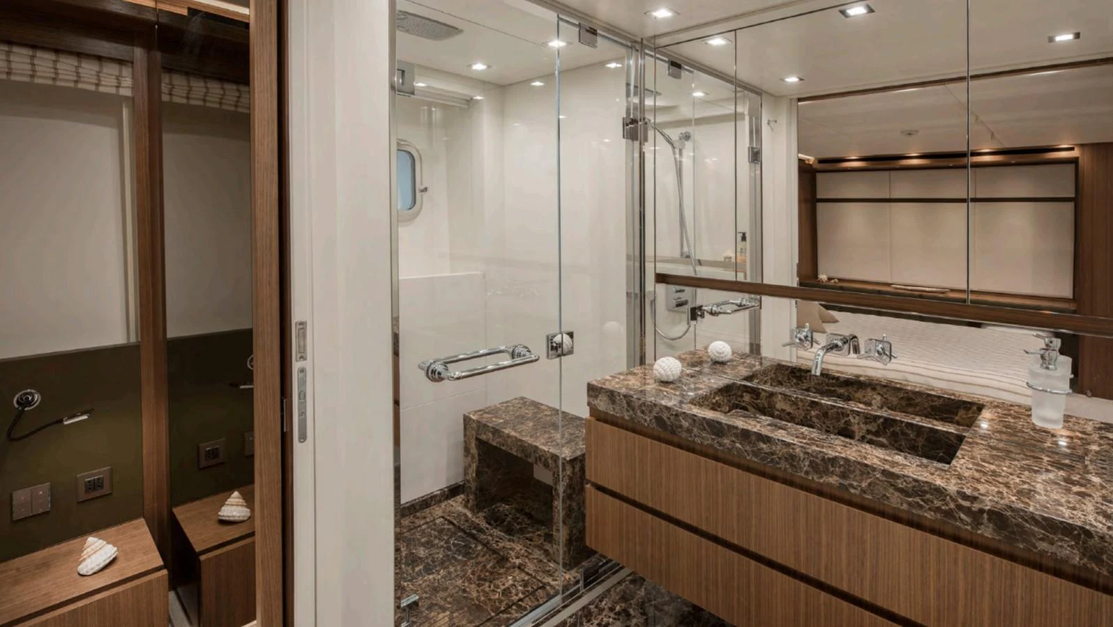 a bathroom with a large mirror aboard KRISTO Yacht for Sale