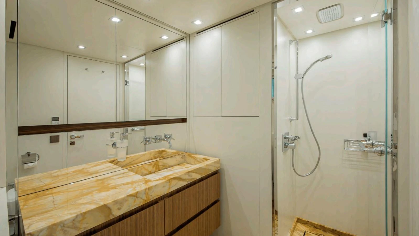 a bathroom with a countertop sink and a shower aboard KRISTO Yacht for Sale