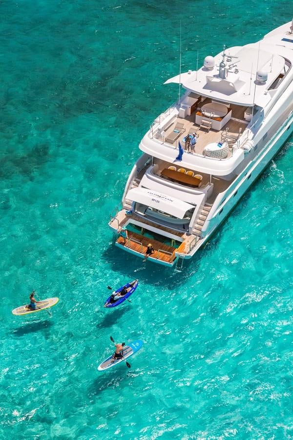 a boat with people on it aboard RP120 (NEW BOAT SPEC) Yacht for Sale