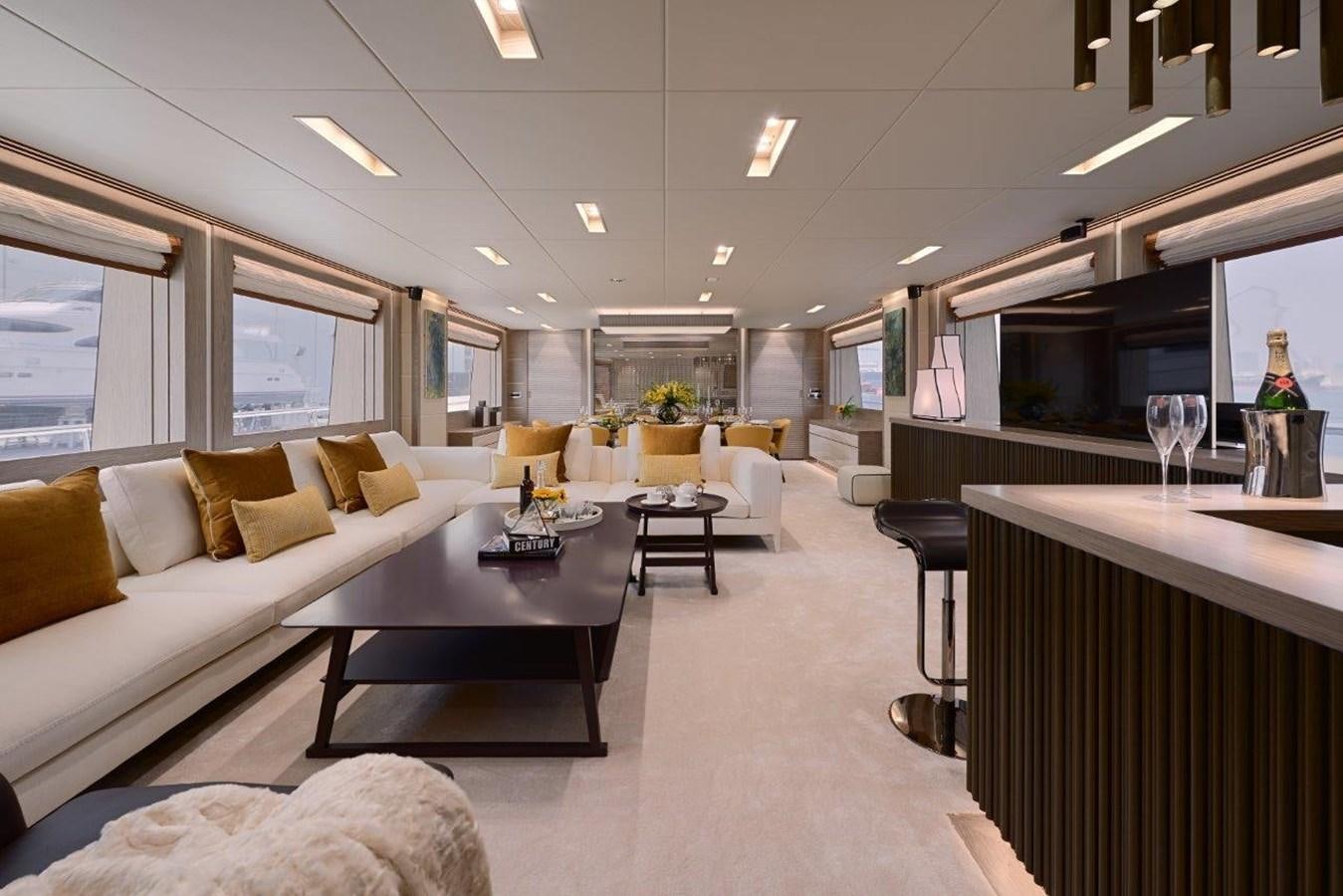 a living room with a couch and a coffee table aboard RP120 (NEW BOAT SPEC) Yacht for Sale