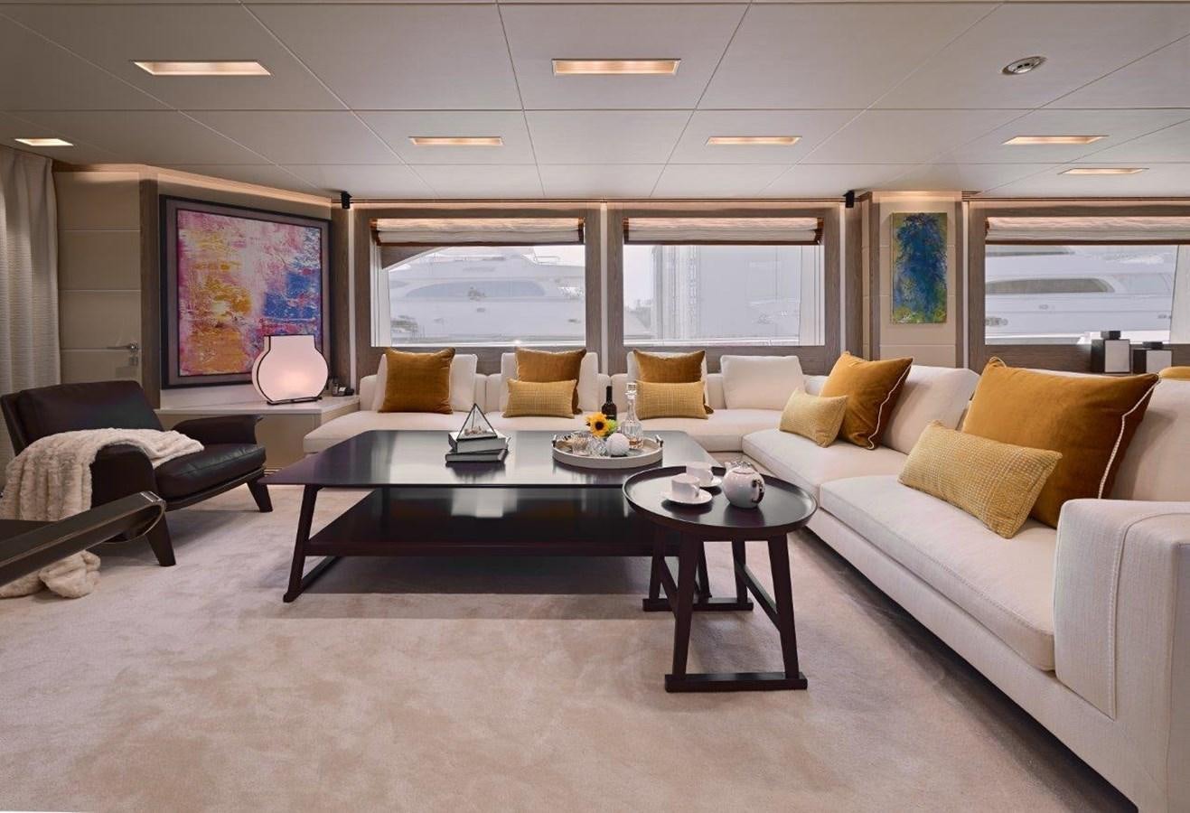 a living room with a large window aboard RP120 (NEW BOAT SPEC) Yacht for Sale