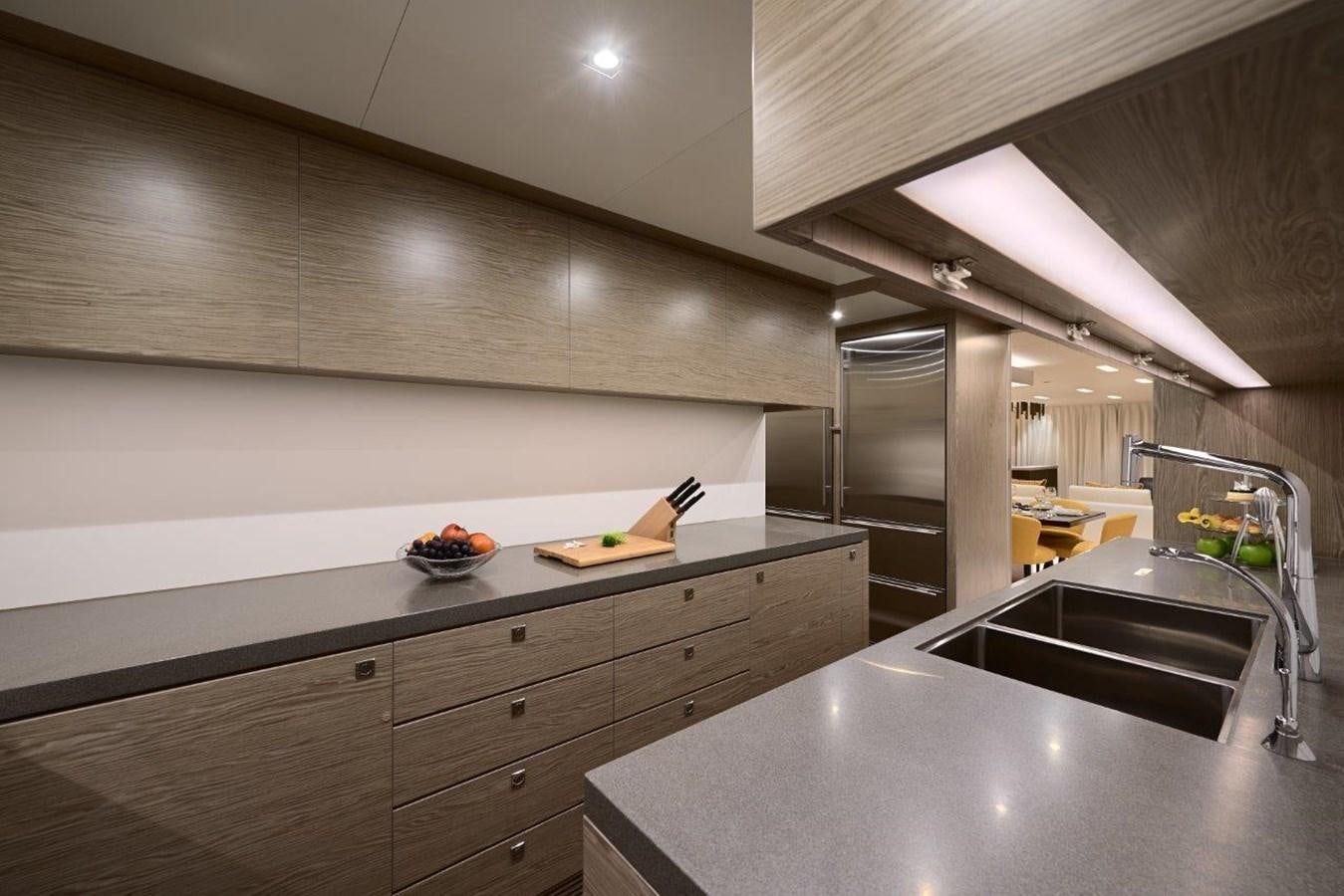 a kitchen with a large island aboard RP120 (NEW BOAT SPEC) Yacht for Sale