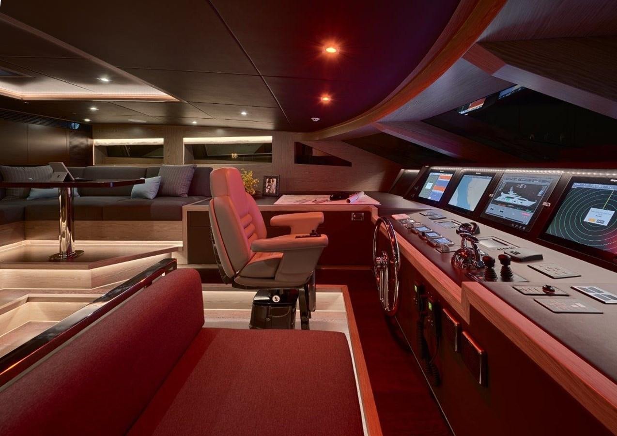 a control room with a row of seats and a table with computer screens aboard RP120 (NEW BOAT SPEC) Yacht for Sale