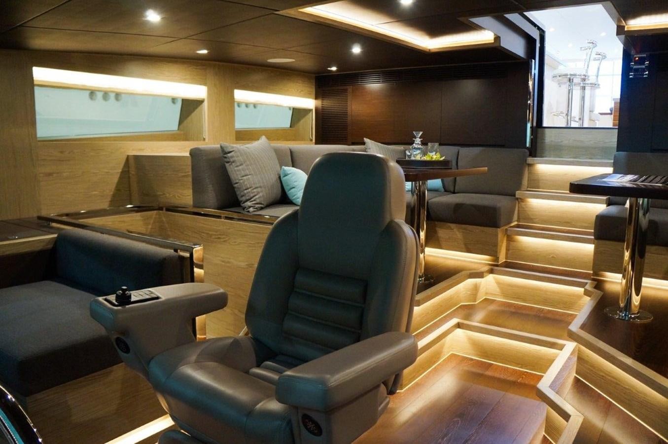 a room with couches and tables aboard RP120 (NEW BOAT SPEC) Yacht for Sale