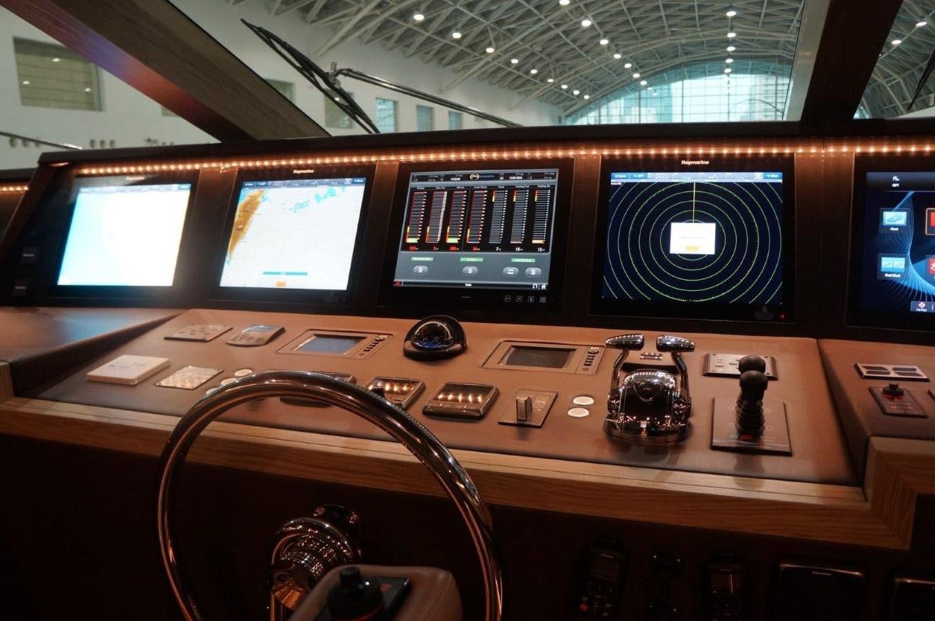 a control panel with multiple monitors aboard RP120 (NEW BOAT SPEC) Yacht for Sale