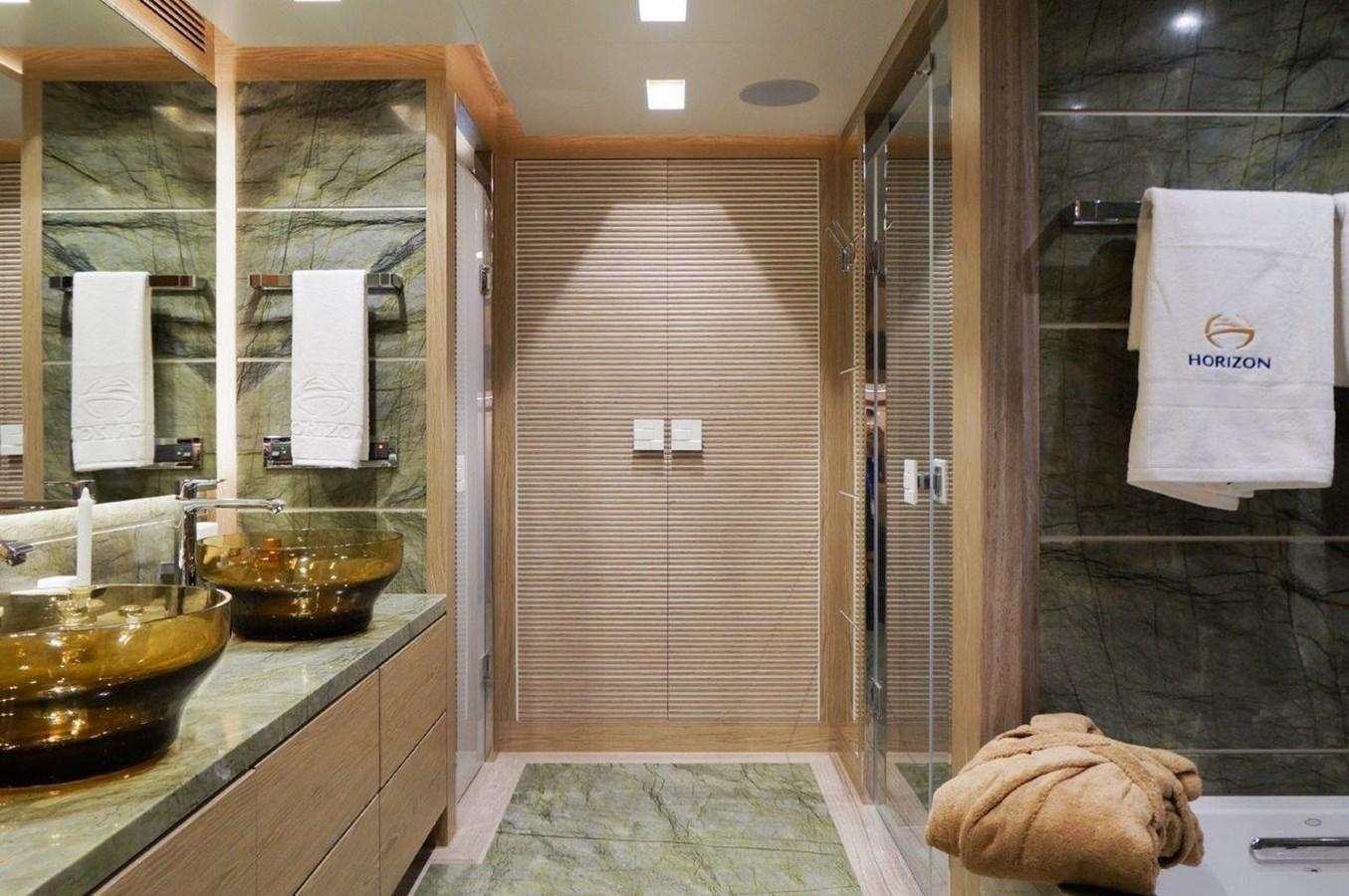 a bathroom with a shower unit and sink aboard RP120 (NEW BOAT SPEC) Yacht for Sale