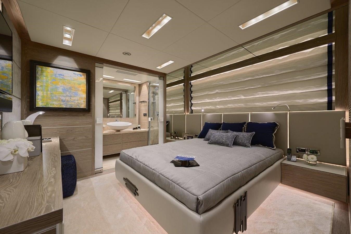a room with a bed and a mirror aboard RP120 (NEW BOAT SPEC) Yacht for Sale