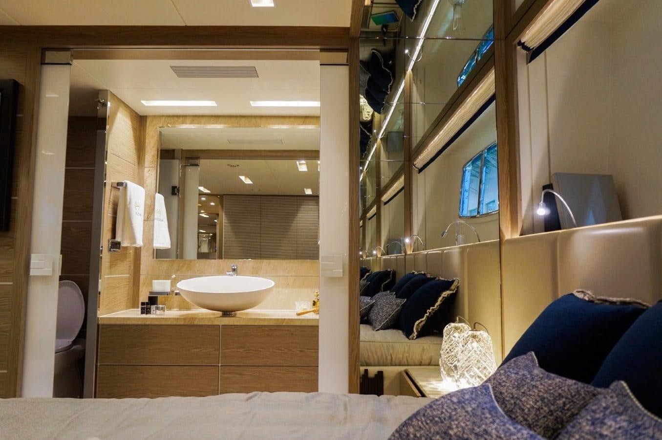 a bathroom with a sink and a mirror aboard RP120 (NEW BOAT SPEC) Yacht for Sale
