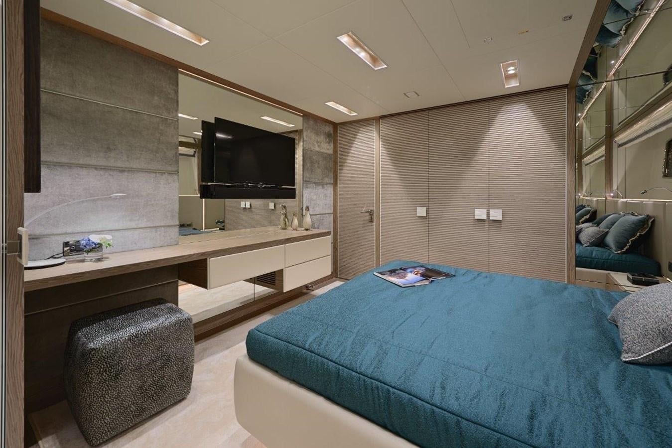 a bedroom with a bed and a tv aboard RP120 (NEW BOAT SPEC) Yacht for Sale