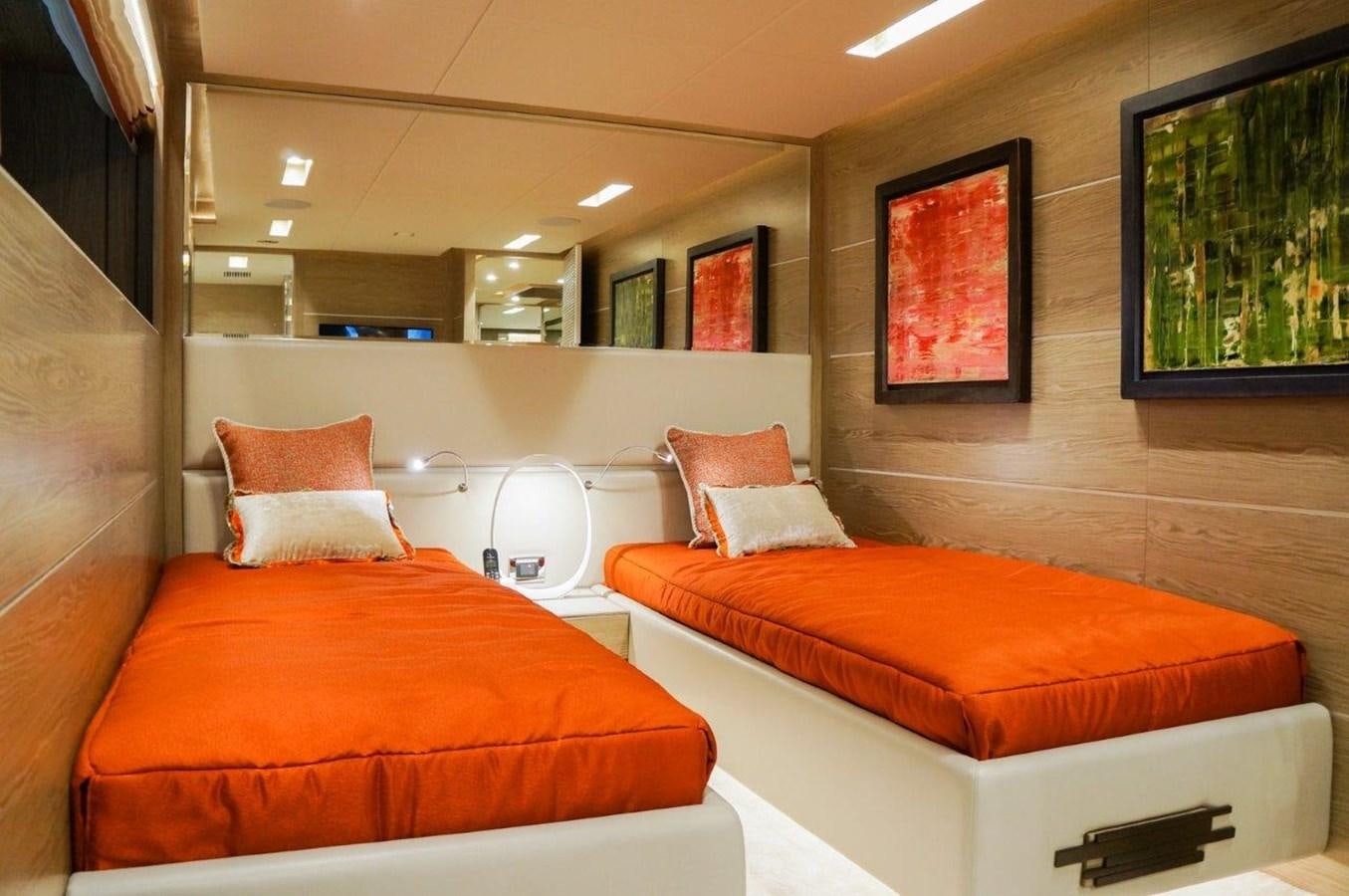 a room with a bed and a chair aboard RP120 (NEW BOAT SPEC) Yacht for Sale
