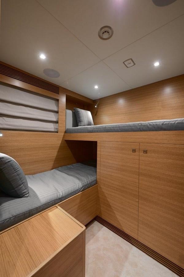 a room with a bed and a couch aboard RP120 (NEW BOAT SPEC) Yacht for Sale