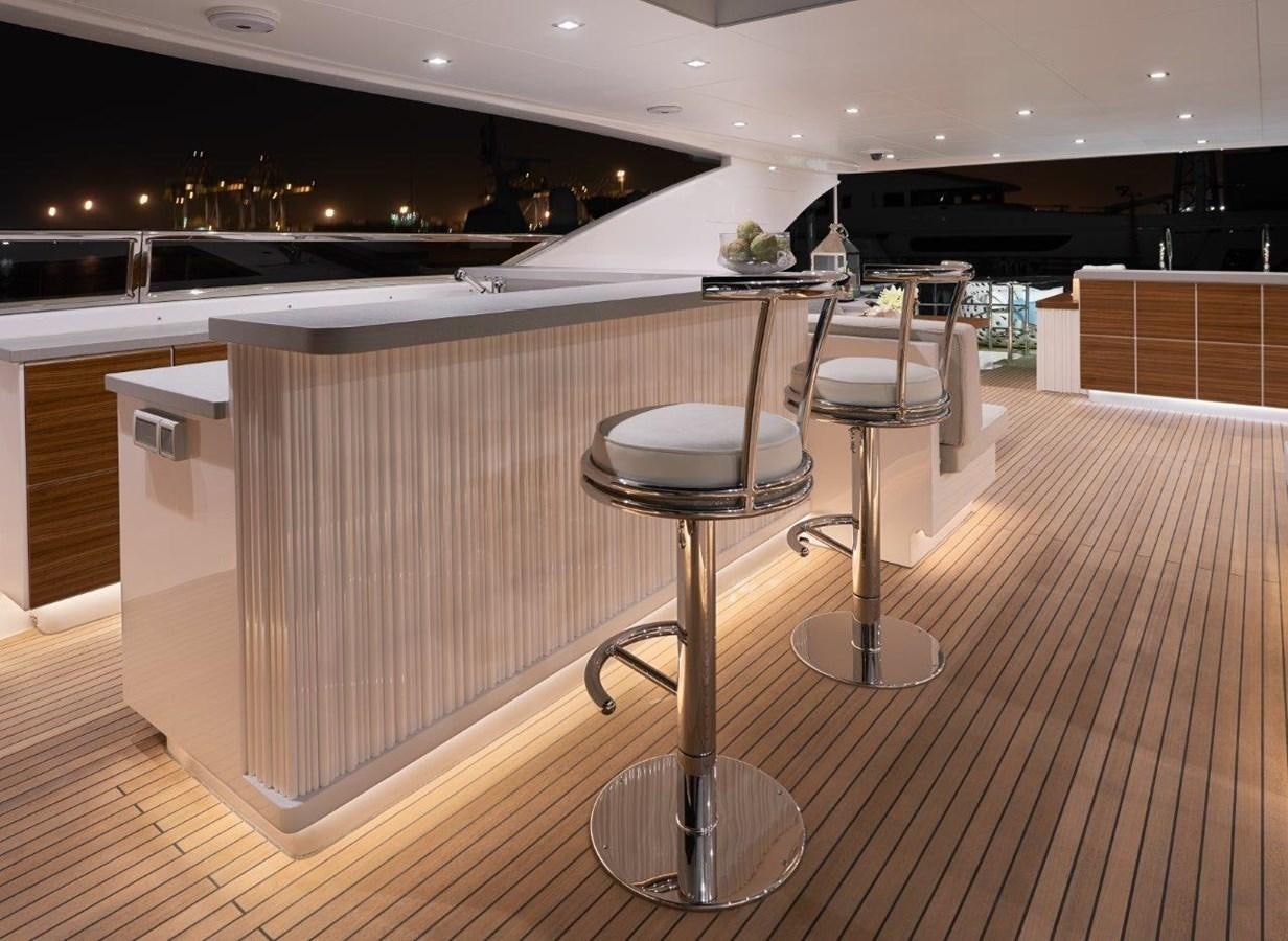 a room with stools and stools aboard RP120 (NEW BOAT SPEC) Yacht for Sale