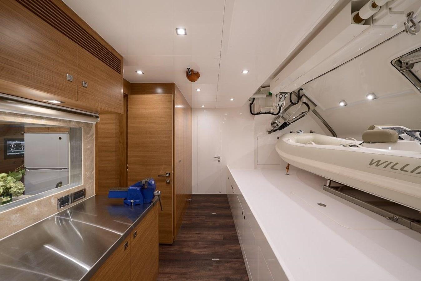 a kitchen with a sink and a large mirror aboard RP120 (NEW BOAT SPEC) Yacht for Sale