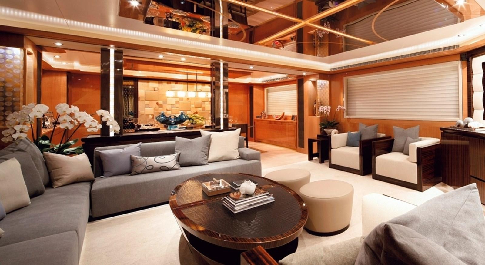 a living room with a large fireplace aboard RP120 (NEW BOAT SPEC) Yacht for Sale