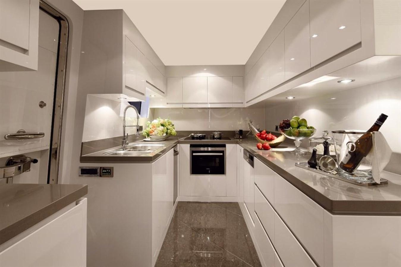 a kitchen with white cabinets aboard RP120 (NEW BOAT SPEC) Yacht for Sale