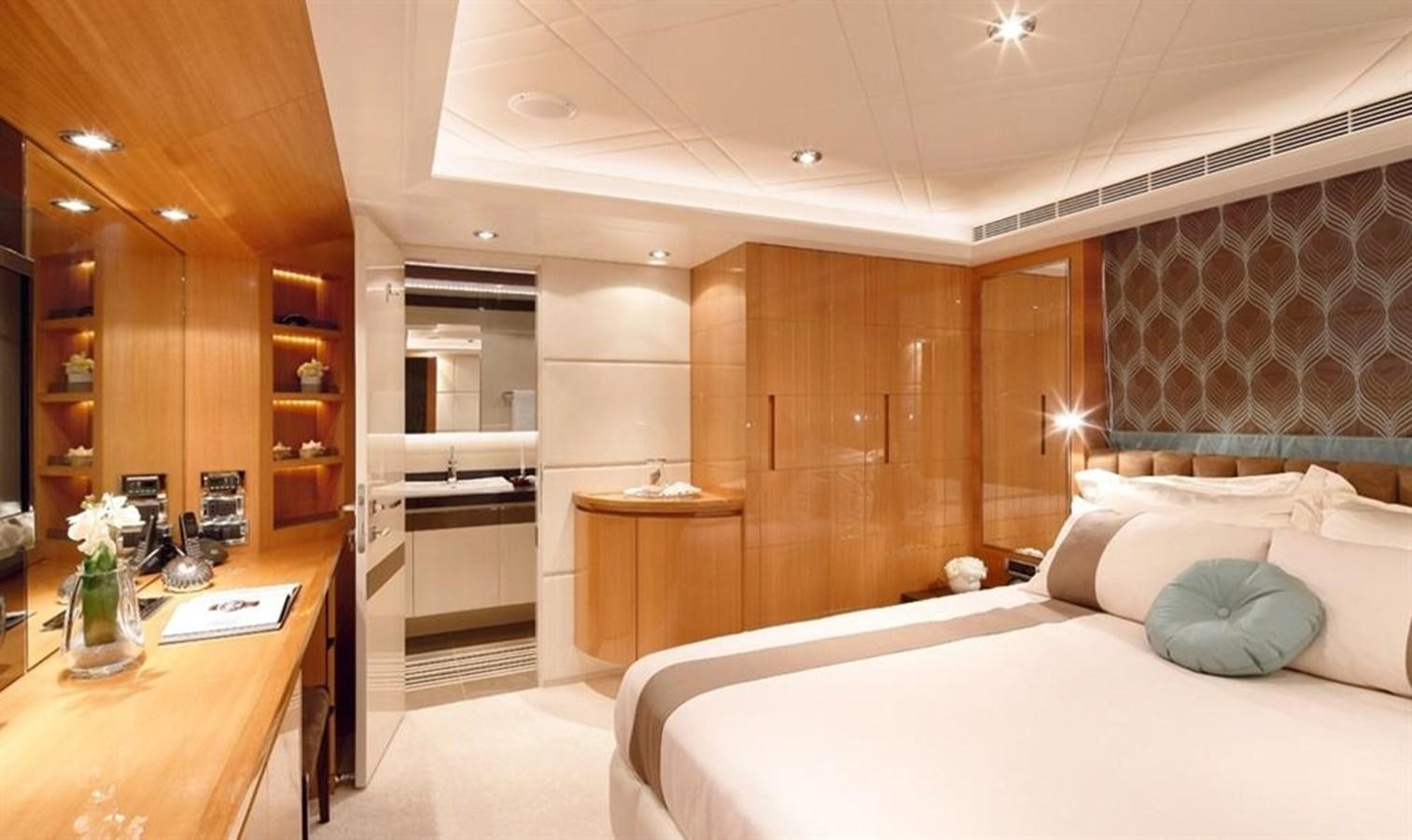a room with a bed and a desk aboard RP120 (NEW BOAT SPEC) Yacht for Sale