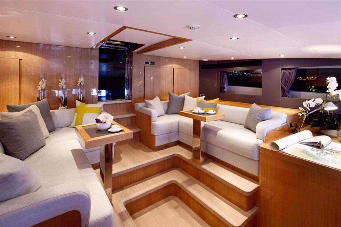 a living room with a couch and a coffee table aboard RP120 (NEW BOAT SPEC) Yacht for Sale