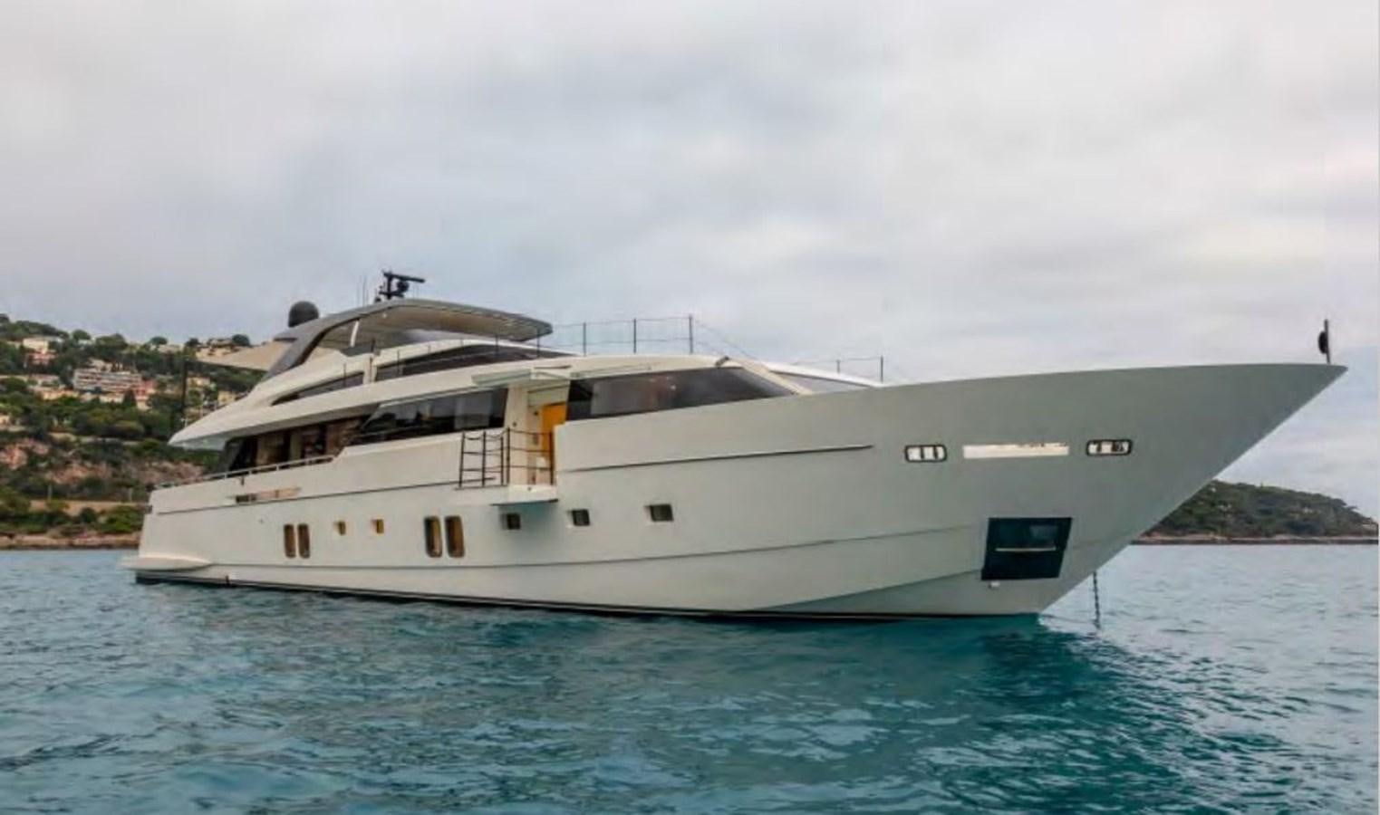 a large white boat in the water aboard CAIA S Yacht for Sale