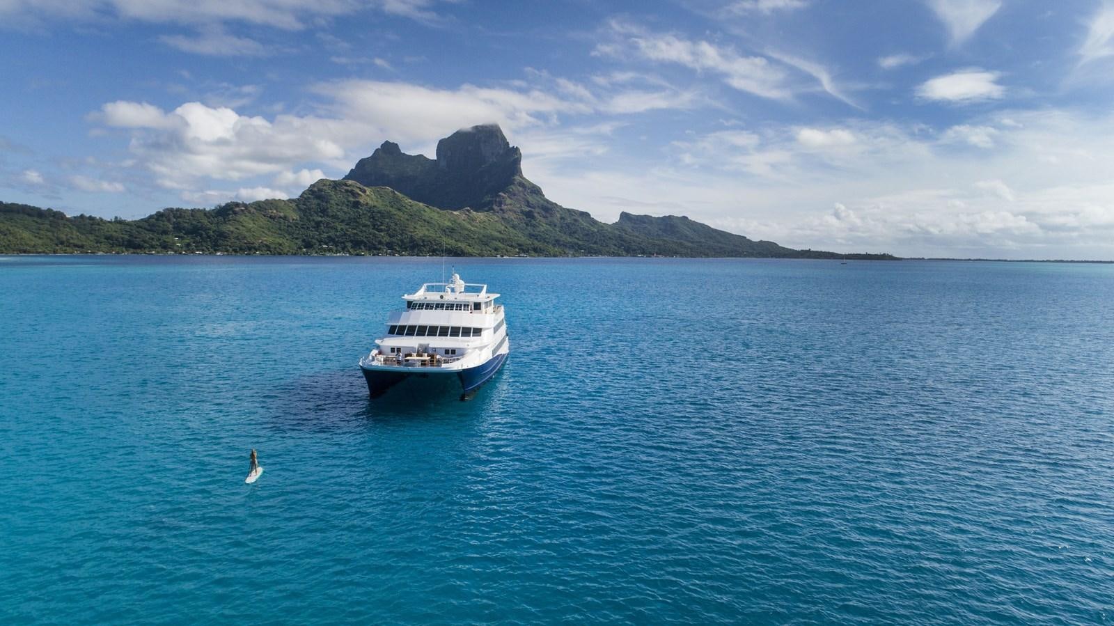 a boat on the water aboard HAUMANA Yacht for Sale