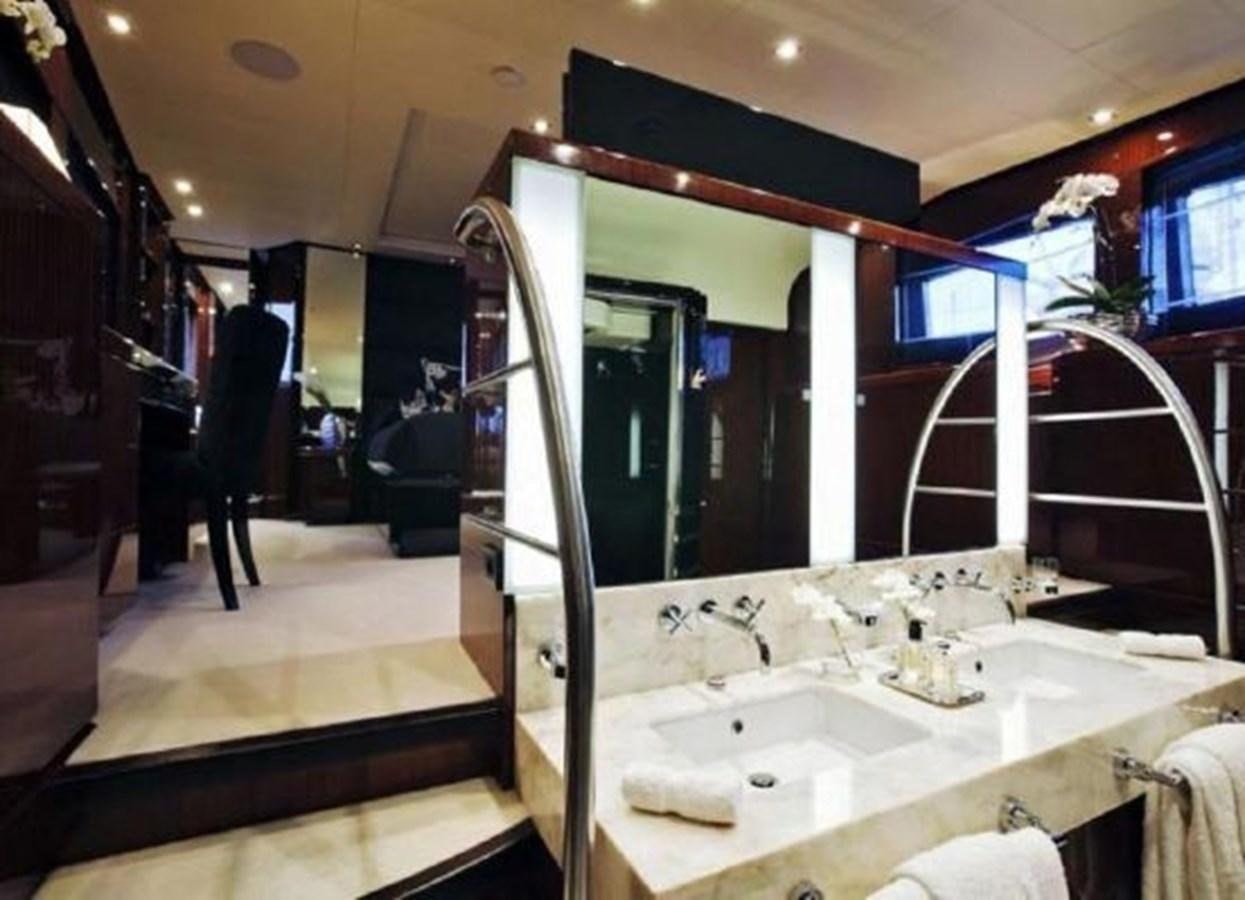 a bathroom with a large mirror aboard ISA 120 Yacht for Sale