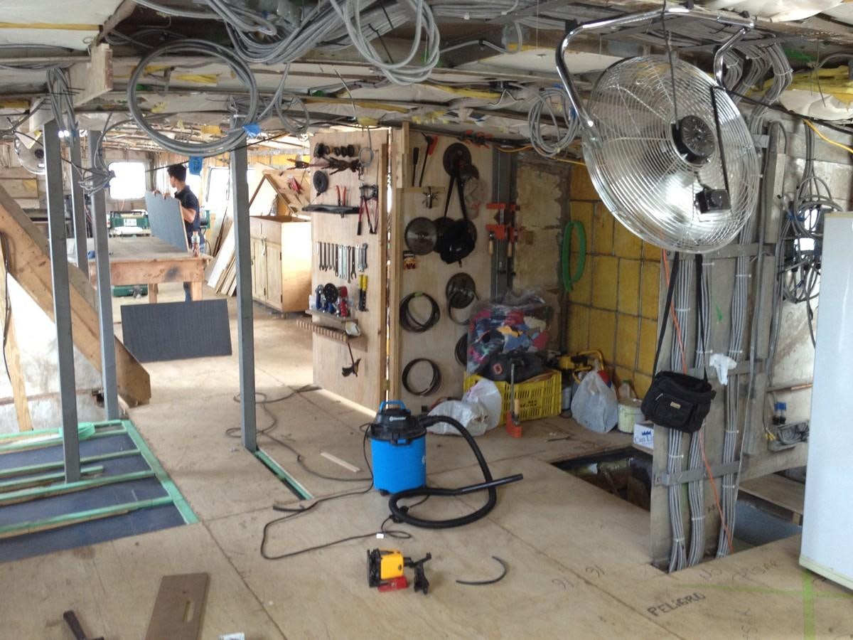 a room with machinery and tools aboard CALLISTO Yacht for Sale