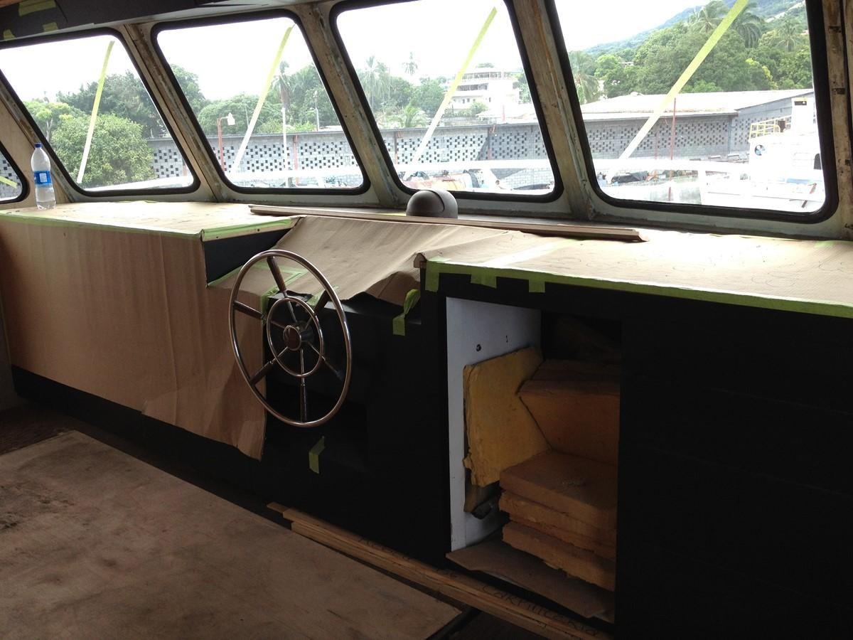 a wooden box with wheels aboard CALLISTO Yacht for Sale