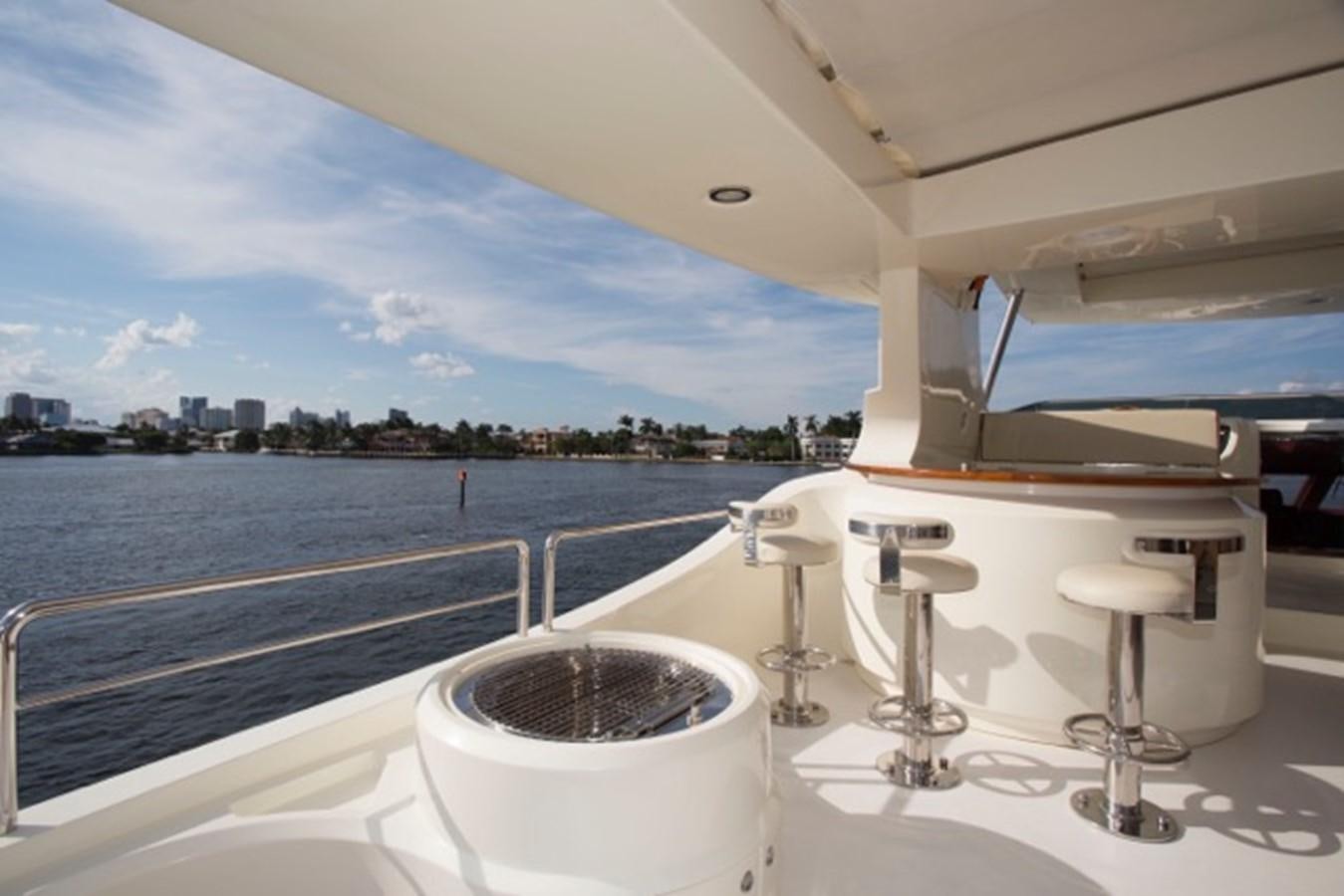 a table on a boat aboard MOMENTO.   2006 AZIMUT 116 @ Yacht for Sale