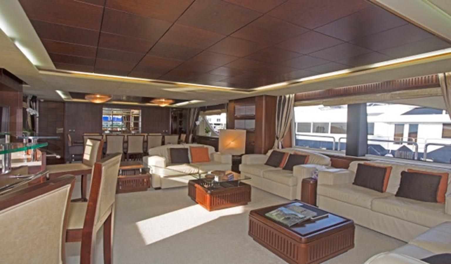a large living room with a large window aboard MOMENTO.   2006 AZIMUT 116 @ Yacht for Sale