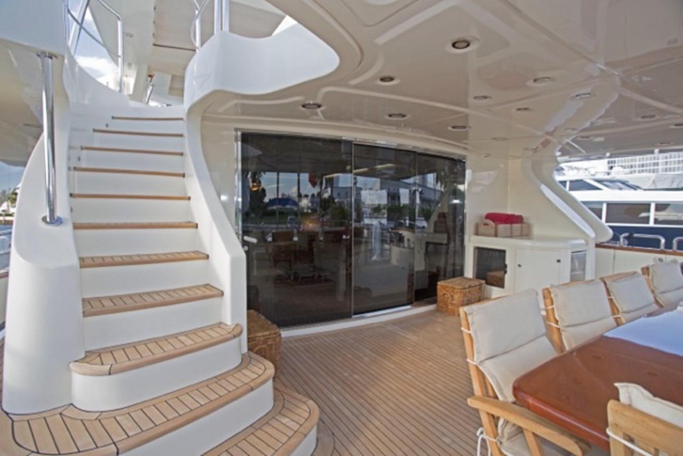 a staircase in a building aboard MOMENTO.   2006 AZIMUT 116 @ Yacht for Sale
