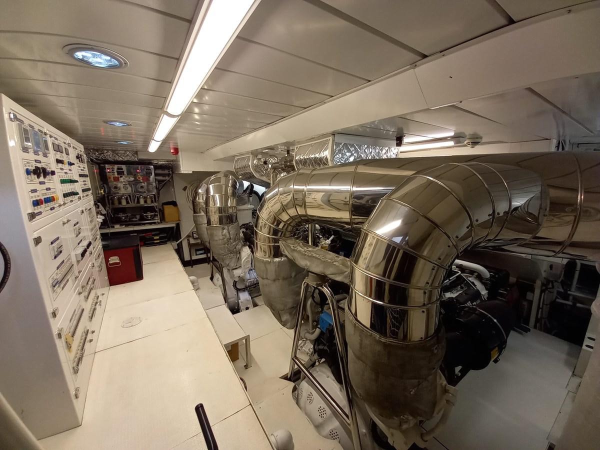 a large machine inside a building aboard FREEDOM Yacht for Sale