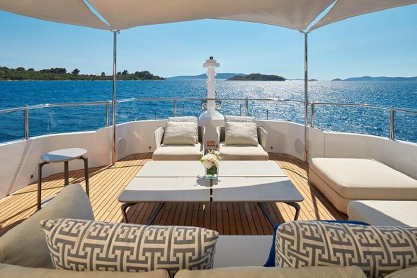 a table on a boat aboard 2018 BENETTI MEDITERRANEO 116 - VIRGIN ISLANDS Yacht for Sale