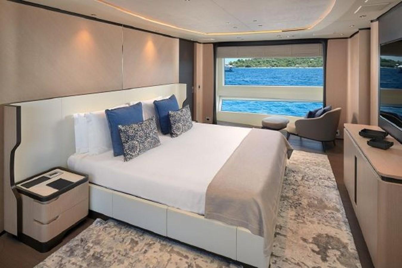 a room with a bed and a window aboard 2018 BENETTI MEDITERRANEO 116 - VIRGIN ISLANDS Yacht for Sale