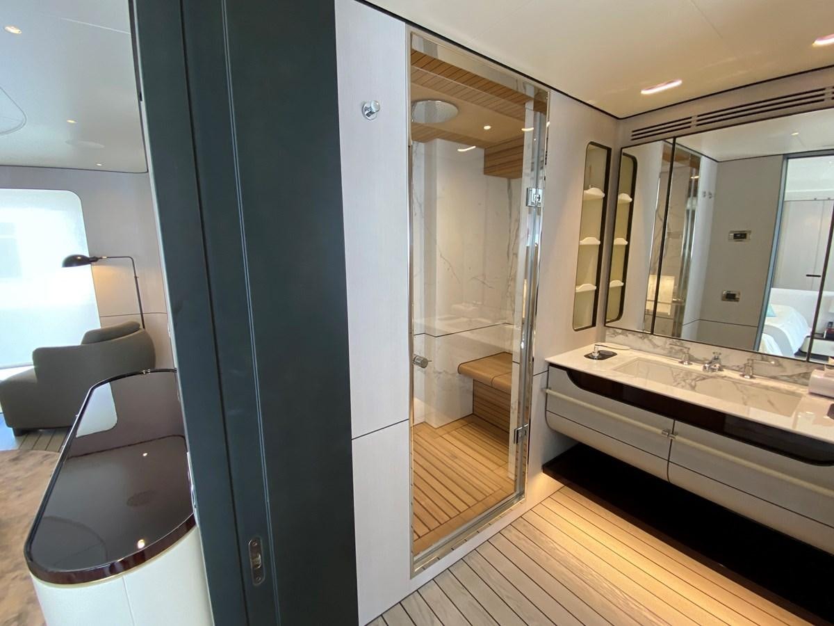 a bathroom with a large mirror aboard PARTNER Yacht for Sale