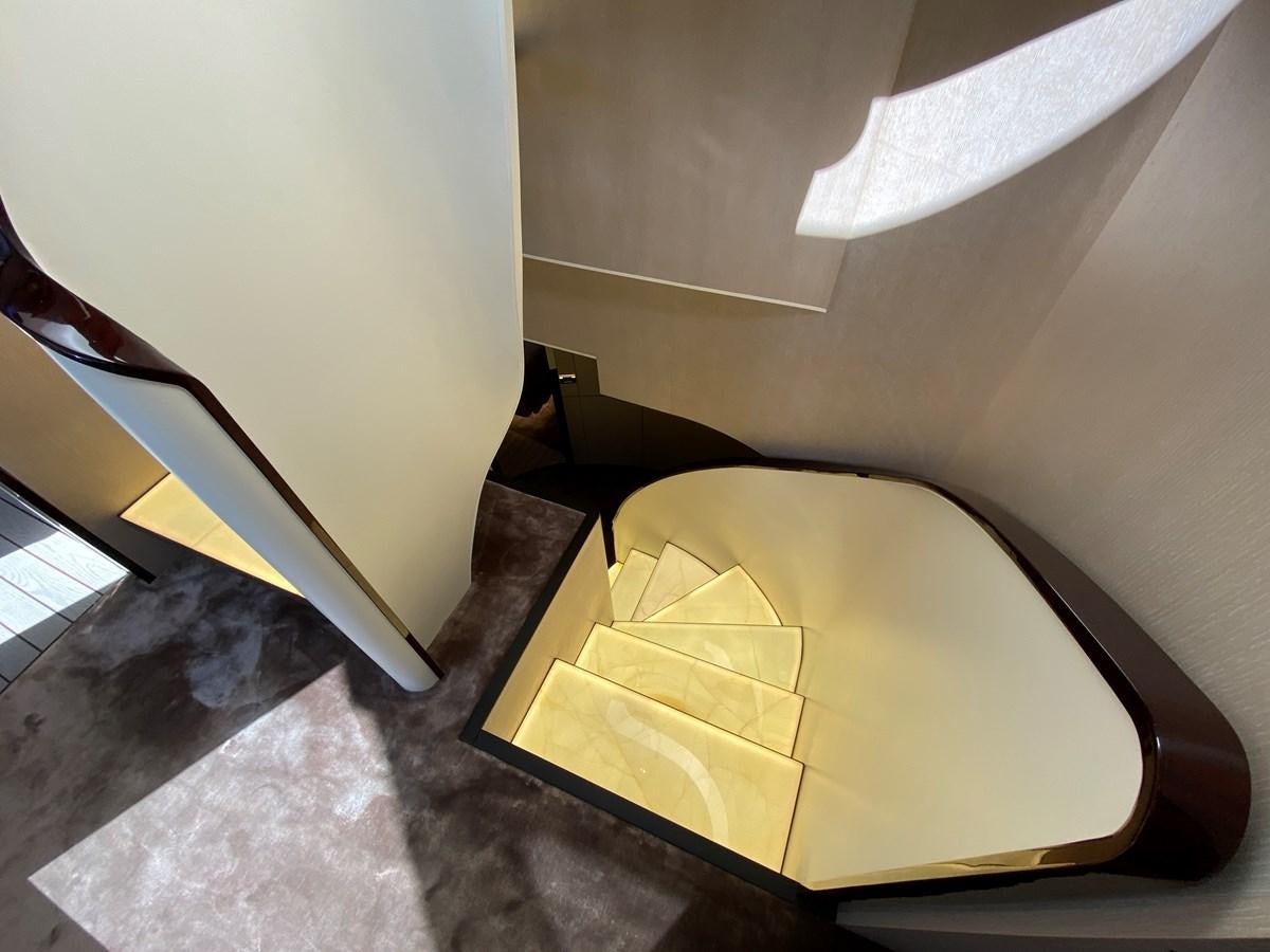 a room with a couch and a rug aboard PARTNER Yacht for Sale