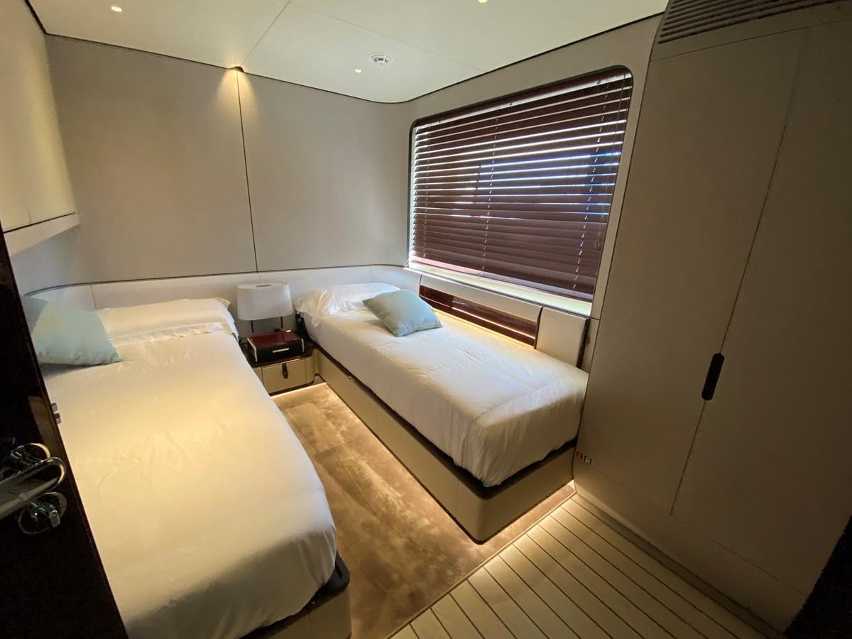 a room with two beds aboard PARTNER Yacht for Sale