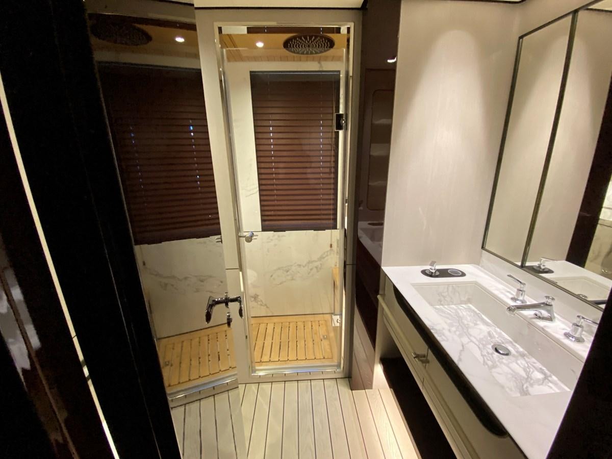 a bathroom with a large mirror aboard PARTNER Yacht for Sale