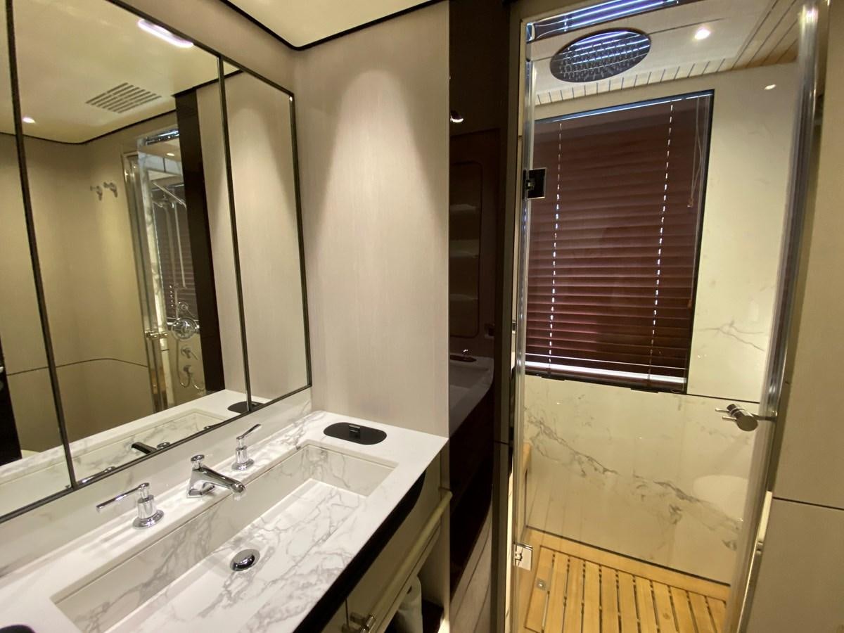 a bathroom with a large mirror aboard PARTNER Yacht for Sale