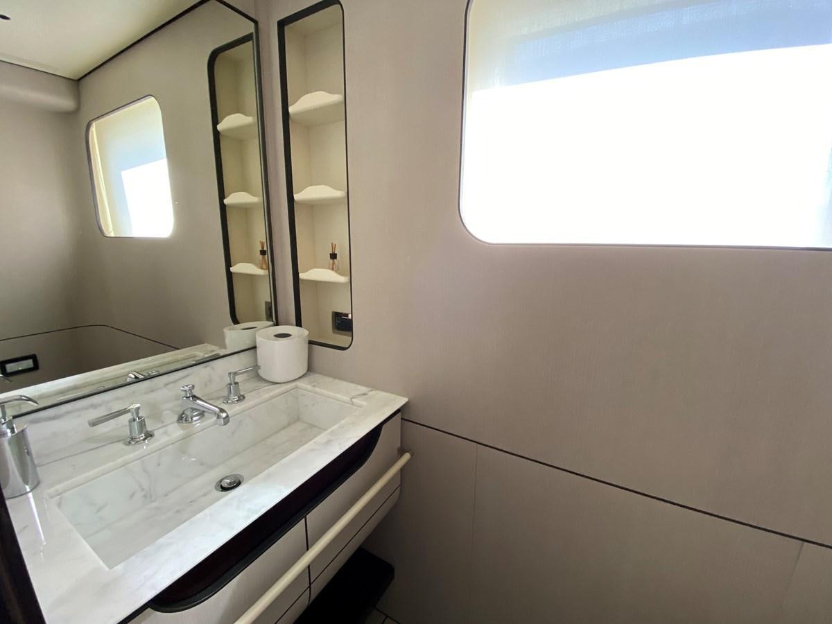 a bathroom with a large mirror aboard PARTNER Yacht for Sale