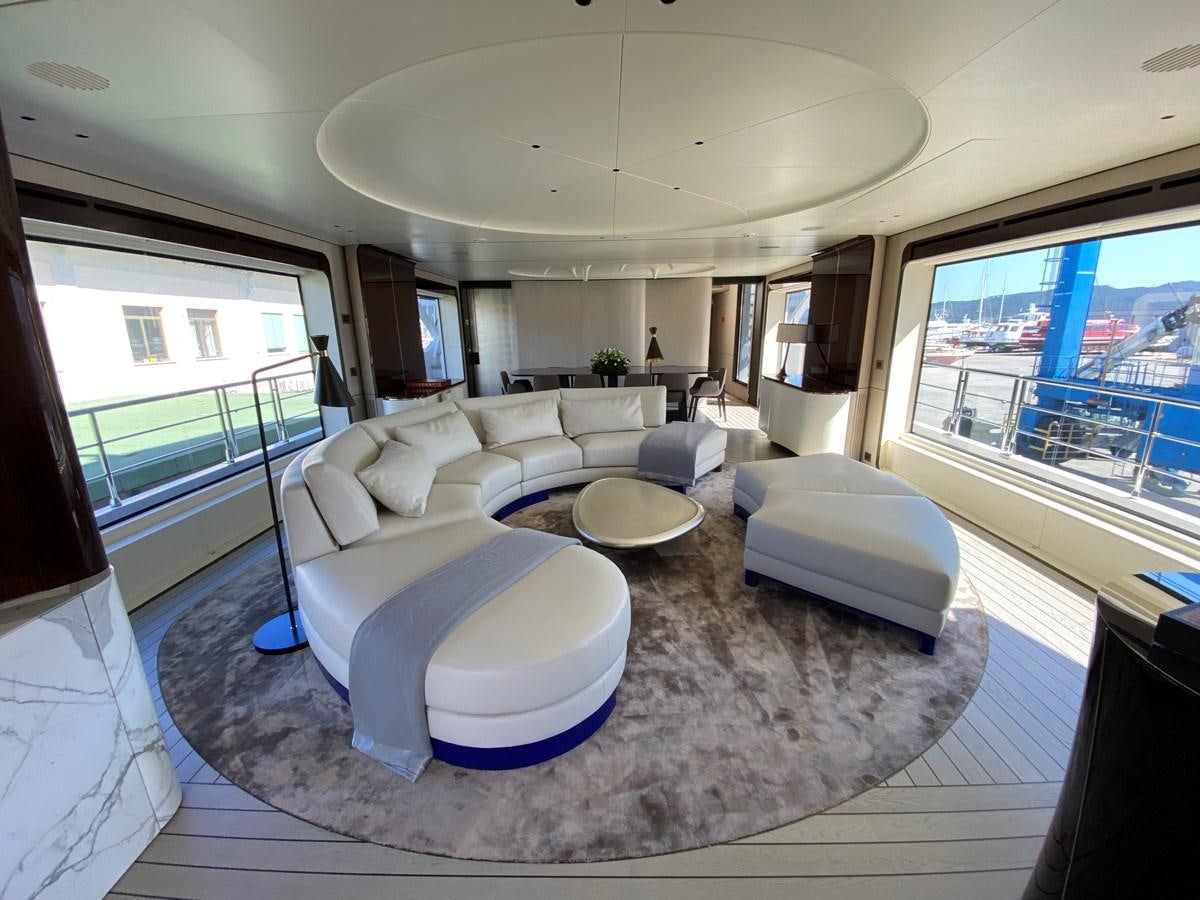 a living room with a large window aboard PARTNER Yacht for Sale