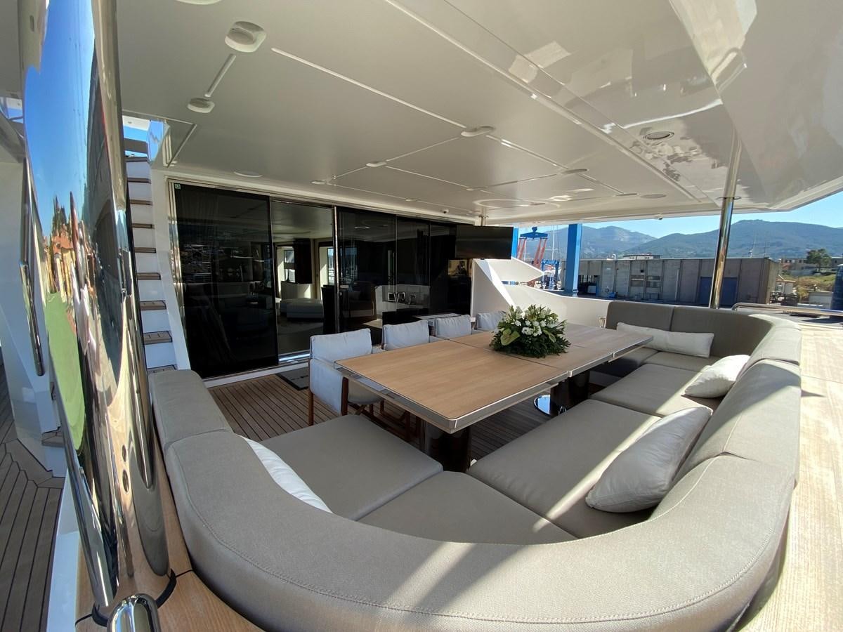 a room with couches and a table aboard PARTNER Yacht for Sale