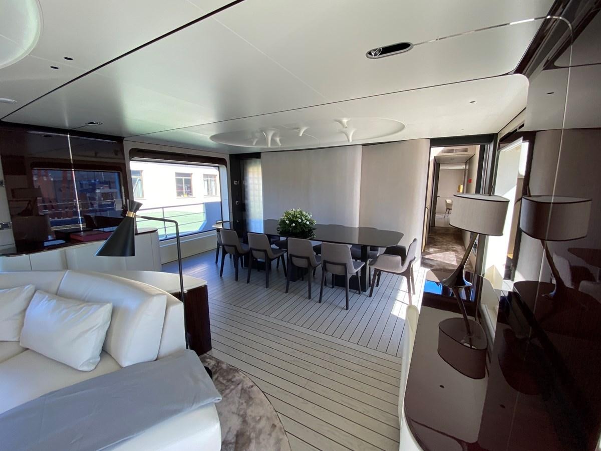a room with a table and chairs aboard PARTNER Yacht for Sale