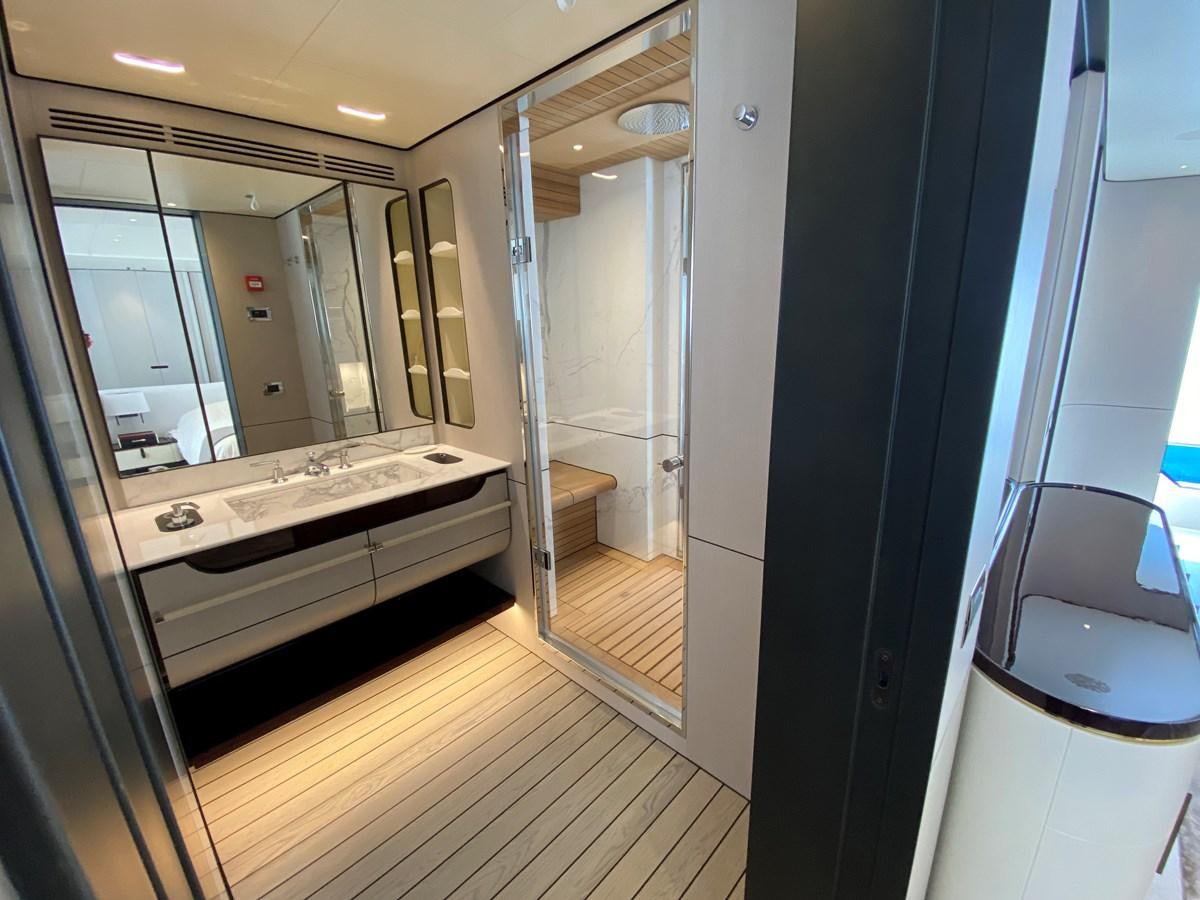 a bathroom with a large mirror aboard PARTNER Yacht for Sale