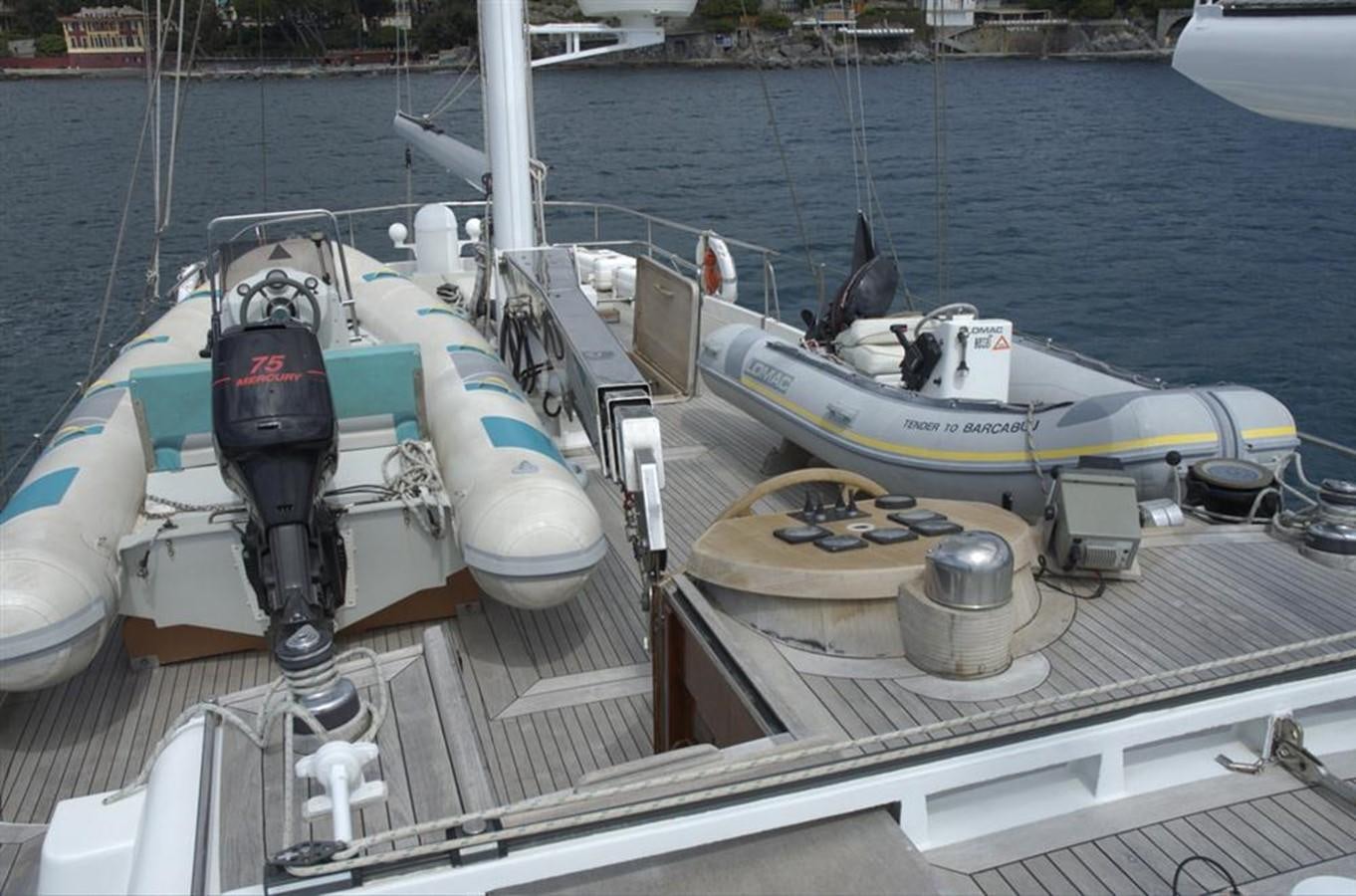 a boat docked at a pier aboard BARCABLU Yacht for Sale