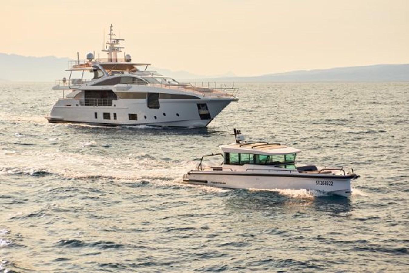 a couple of boats in the water aboard 2019 AZIMUT GRANDE 35 METRI Yacht for Sale