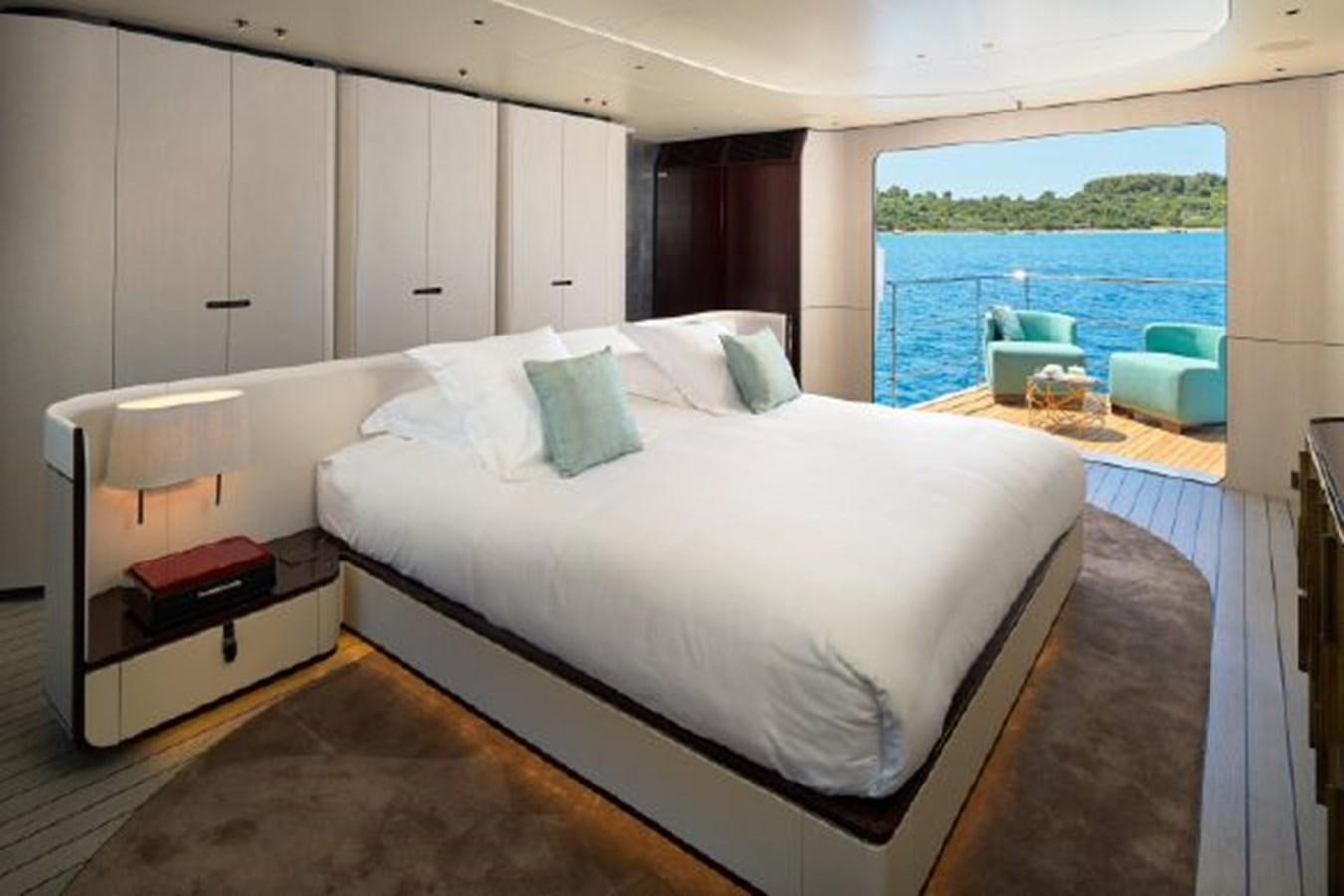 a room with a bed and a window aboard 2019 AZIMUT GRANDE 35 METRI Yacht for Sale