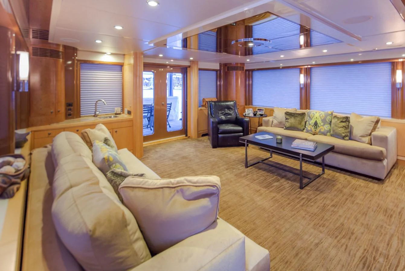 a living room with a couch and a coffee table aboard C JEWEL Yacht for Sale