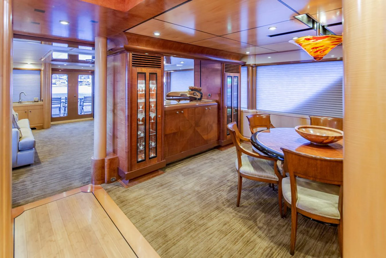 a dining room with a table and chairs aboard C JEWEL Yacht for Sale
