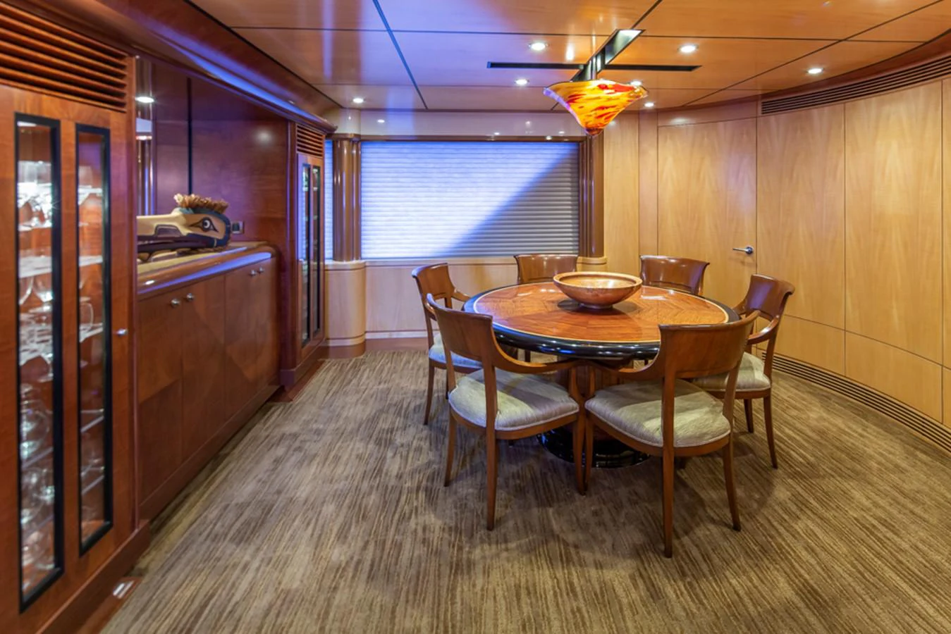 a dining room with a table and chairs aboard C JEWEL Yacht for Sale