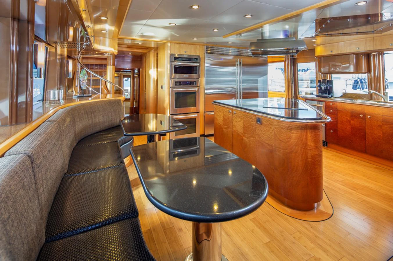 a living room with a bar and a couch aboard C JEWEL Yacht for Sale
