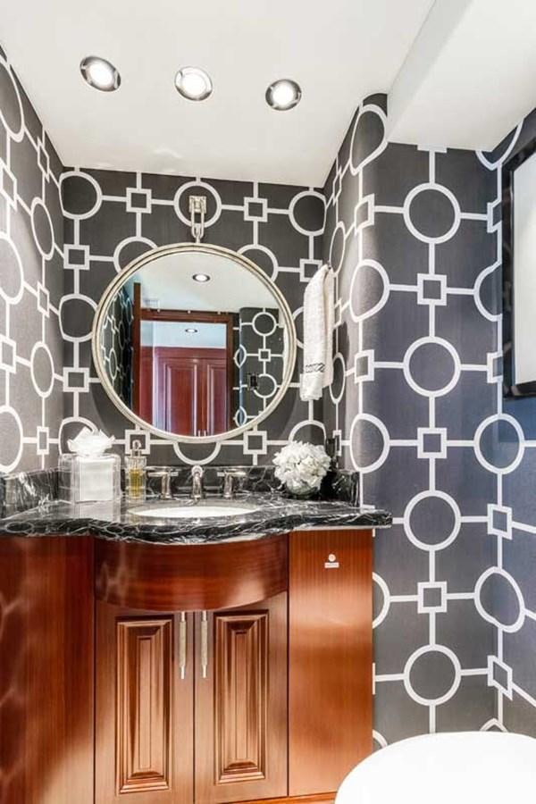 a bathroom with a mirror aboard OUR HERITAGE Yacht for Sale